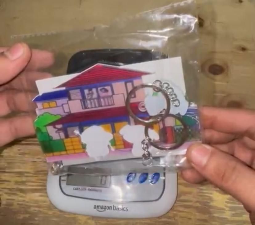 Keychain with colorful packaging on a digital scale
